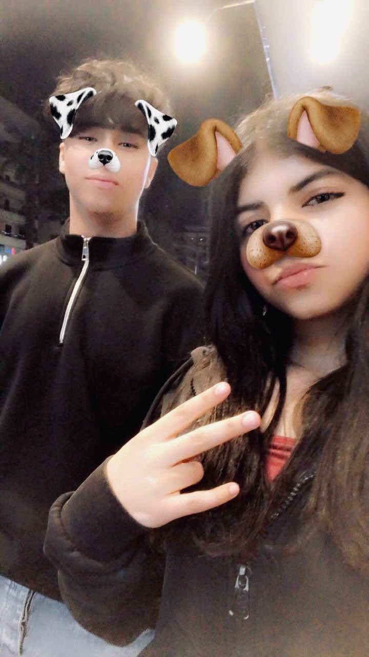 Anas and Farida with a puppy filter