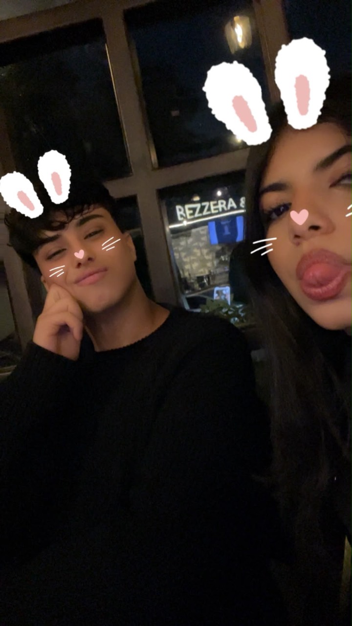 Anas and Farida taking a selfie with a bunny filter