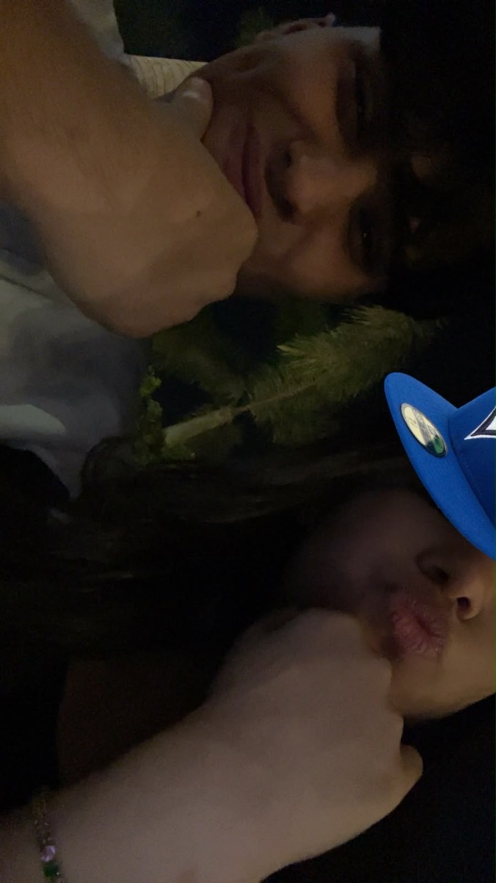 Anas and Farida with a blue cap filter